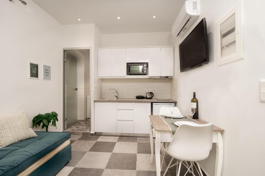 Kuchyň nebo kuchyňský kout v ubytování Eden Apartments by CorfuEscapes