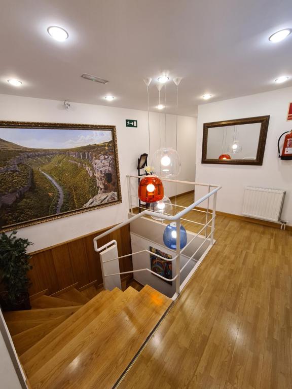 TV a/nebo společenská místnost v ubytování Hotel Jacobeo