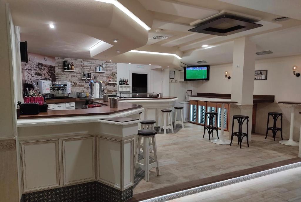 Kuchyň nebo kuchyňský kout v ubytování HOSTAL-CAFE GUTGRECO