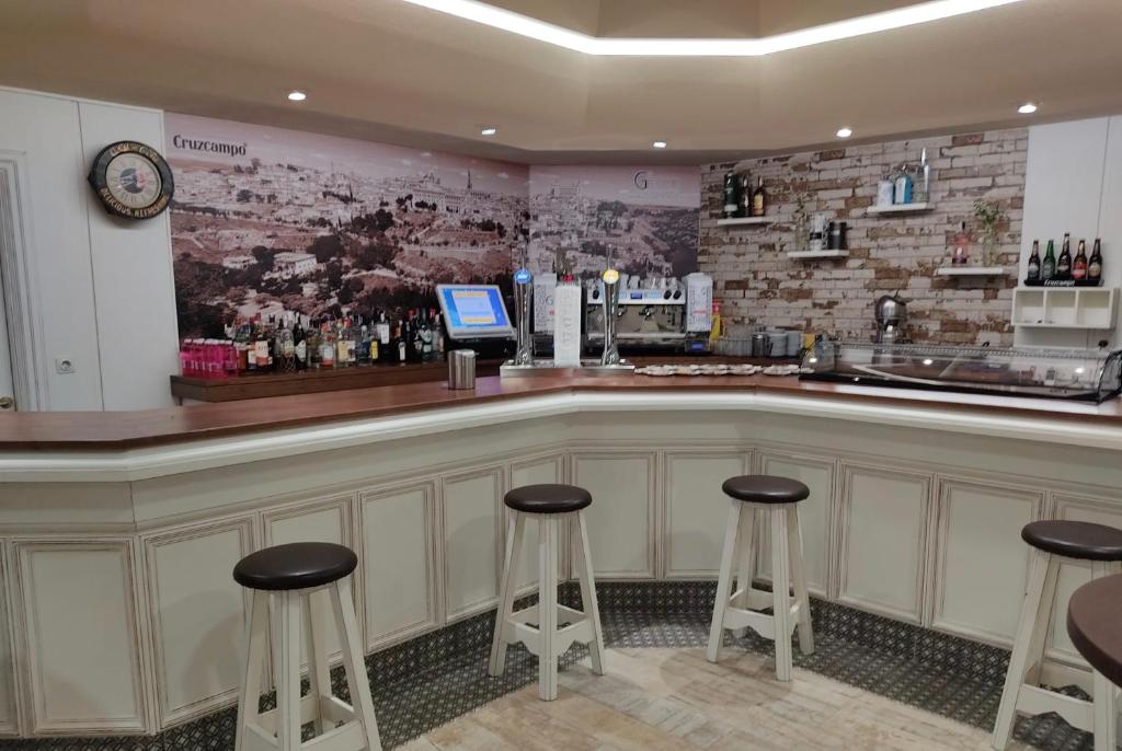Lounge nebo bar v ubytování HOSTAL-CAFE GUTGRECO