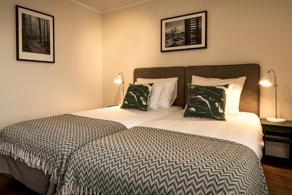 Кровать или кровати в номере Hotell Granen