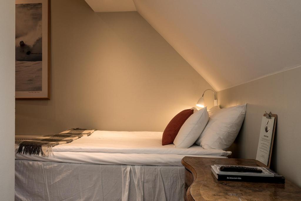Кровать или кровати в номере Hotell Granen