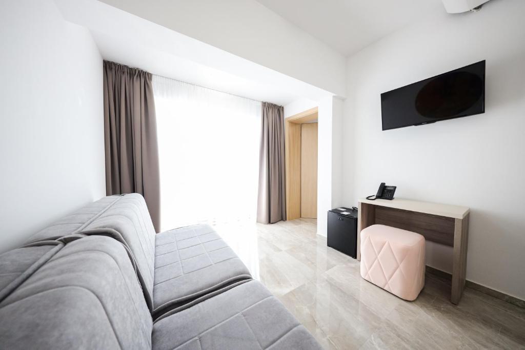 TV a/nebo společenská místnost v ubytování Hotel Lucija