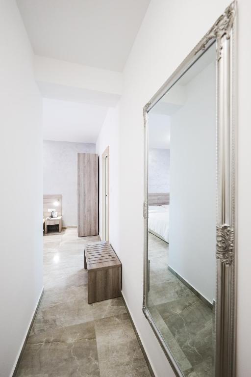 Postel nebo postele na pokoji v ubytování Hotel Lucija