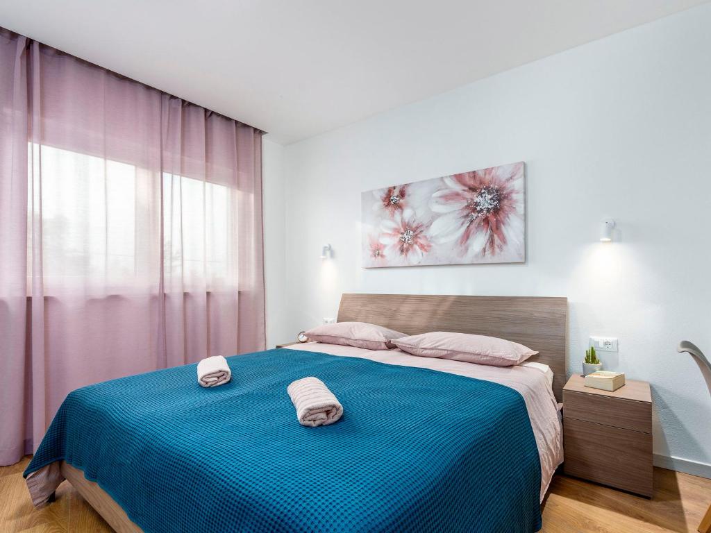 Postel nebo postele na pokoji v ubytování Holiday Home Villa Isabela by Interhome