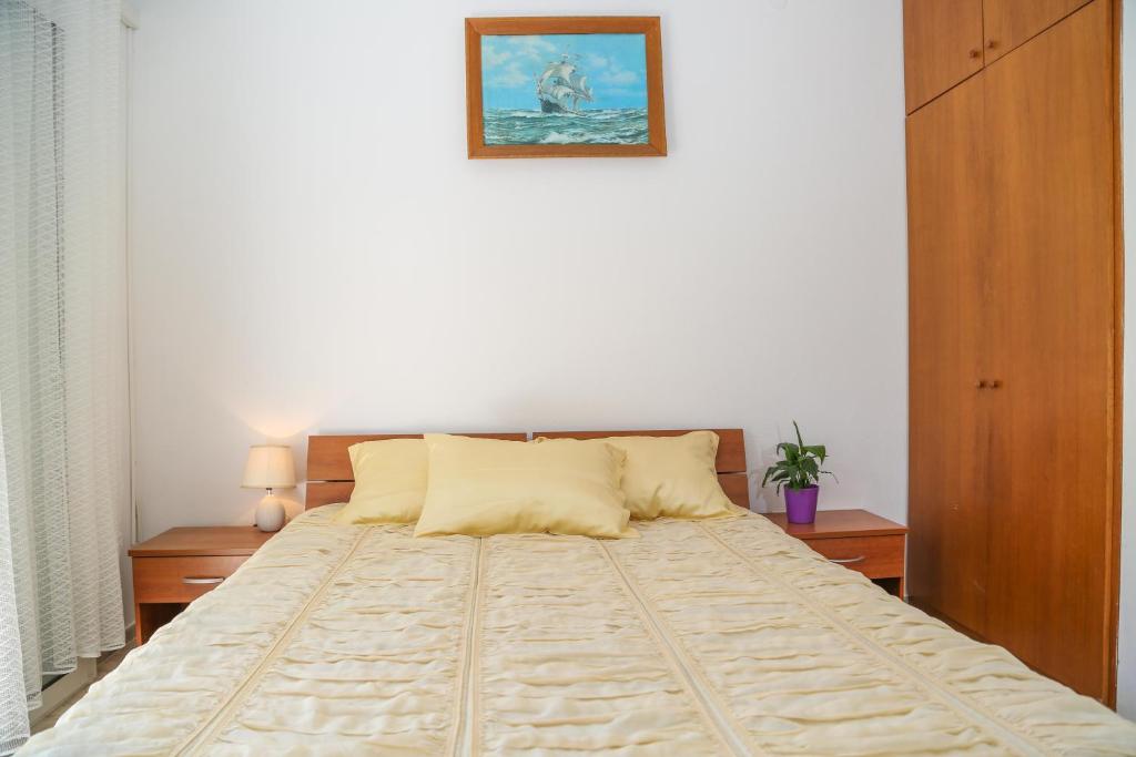 Postel nebo postele na pokoji v ubytování Apartments Butkovic