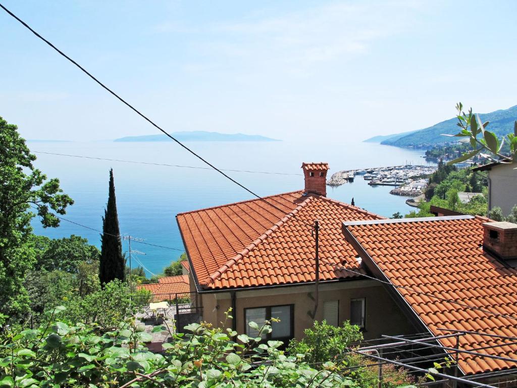 a view of a house with red tile roofs at Apartment Hela - LOV512 by Interhome in Opatija
