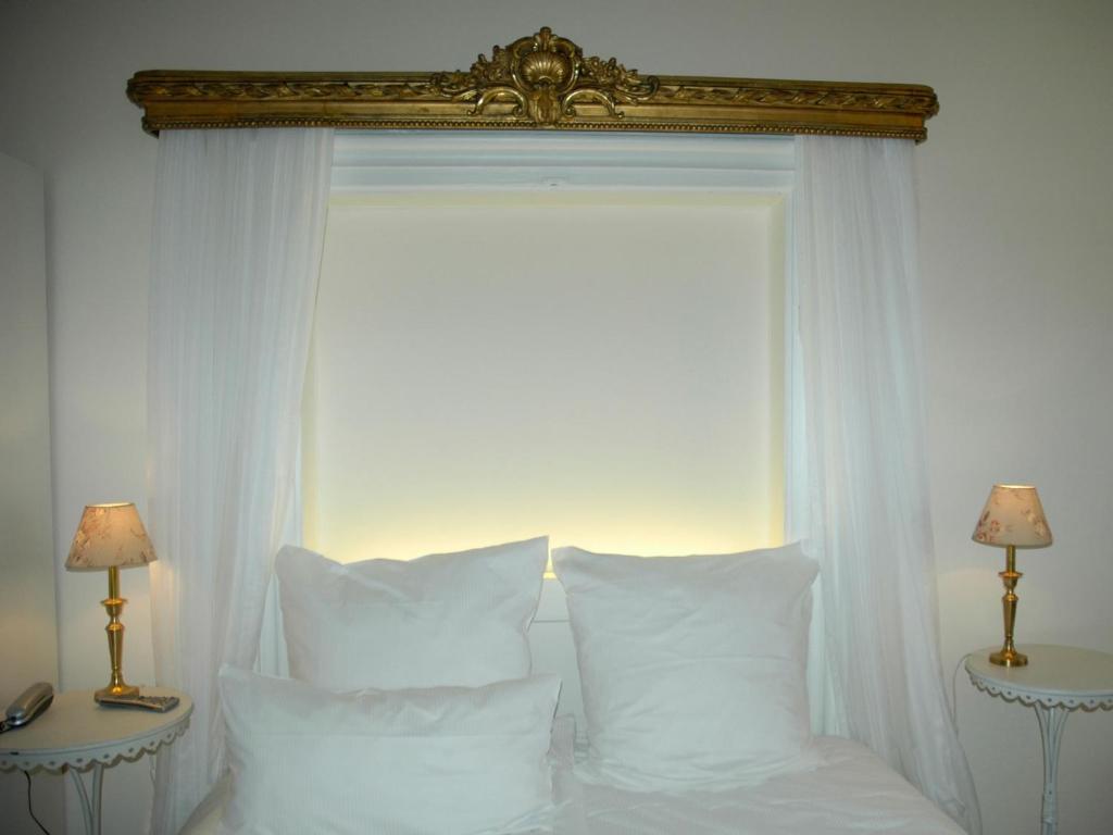 Postel nebo postele na pokoji v ubytování Hotel Goldenes Kreuz