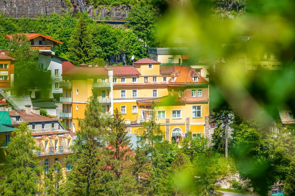 a group of houses on the side of a hill at Hotel Bristol in Bad Gastein