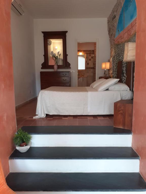 Postel nebo postele na pokoji v ubytování Scaglie di Mare