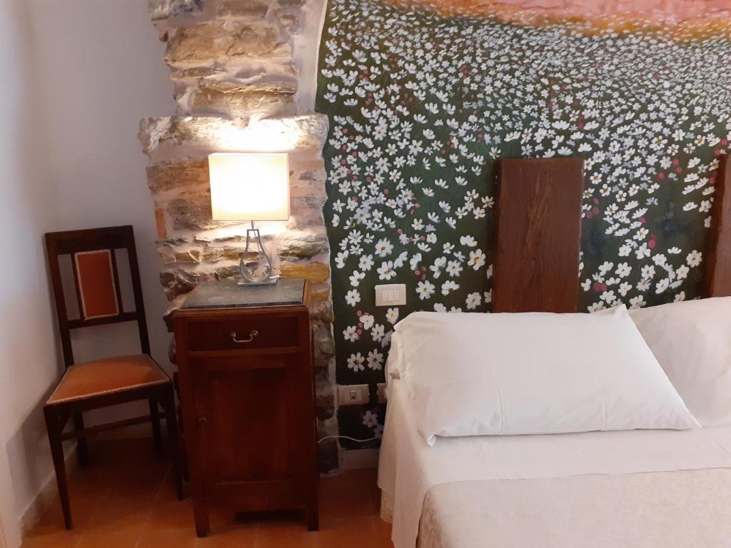 Postel nebo postele na pokoji v ubytování Scaglie di Mare
