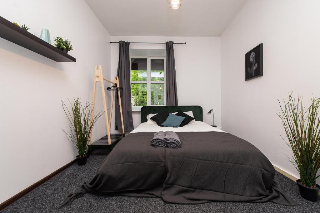 Postel nebo postele na pokoji v ubytování The house Vilnius