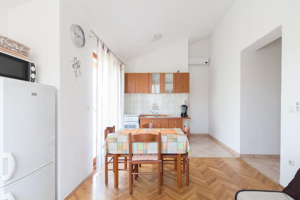 Kuchyňa alebo kuchynka v ubytovaní Apartments Casa Nada