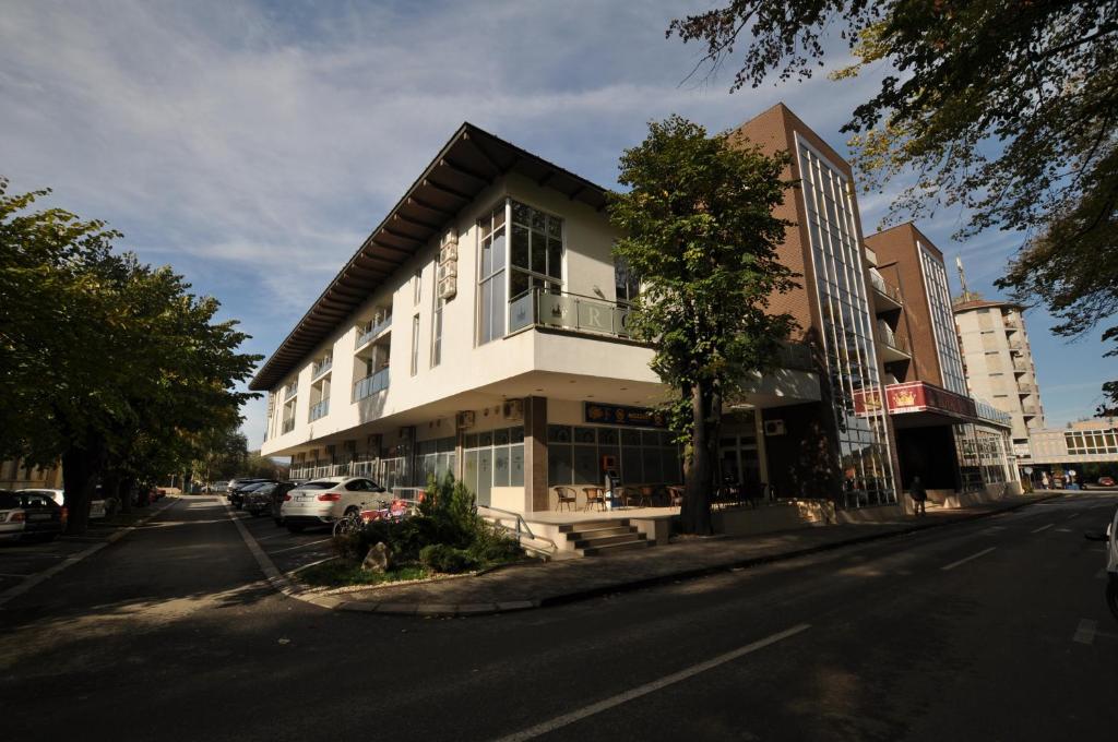 a building on the side of a street at Hotel Royal Spa in Banja Koviljača