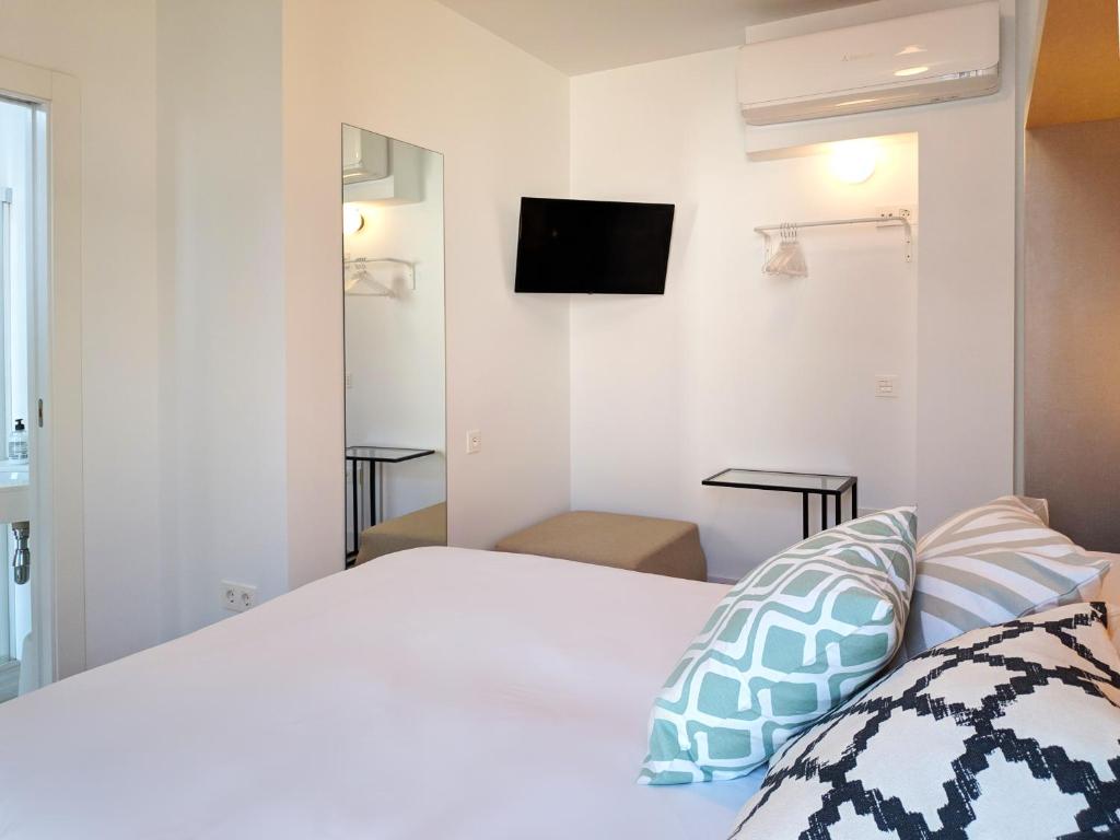 Postel nebo postele na pokoji v ubytování Broz Hostel