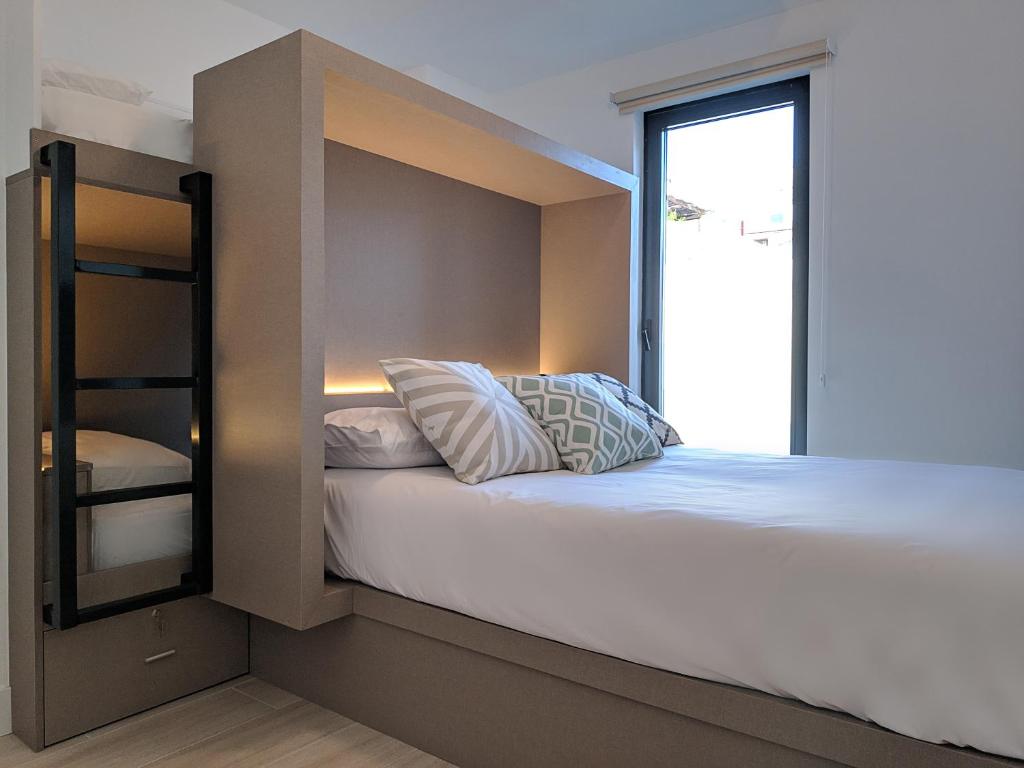 Postel nebo postele na pokoji v ubytování Broz Hostel