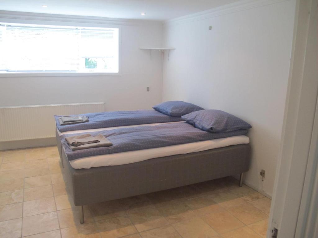 A bed or beds in a room at Guesthouse Sharon Aarhus