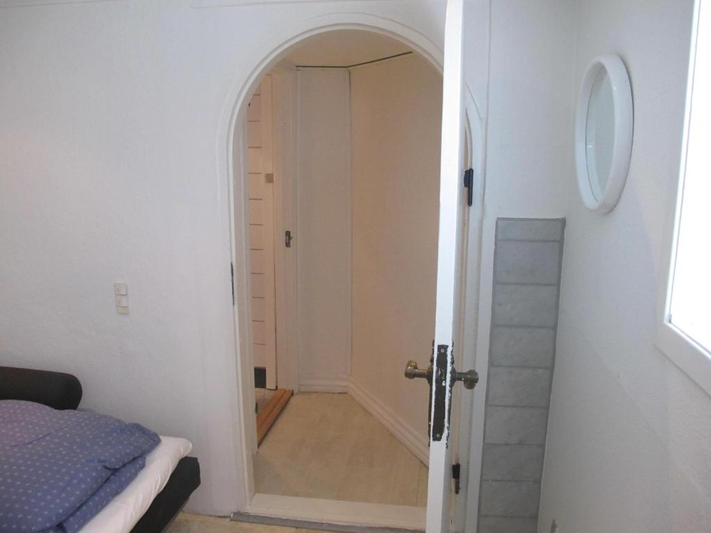 A bed or beds in a room at Guesthouse Sharon Aarhus
