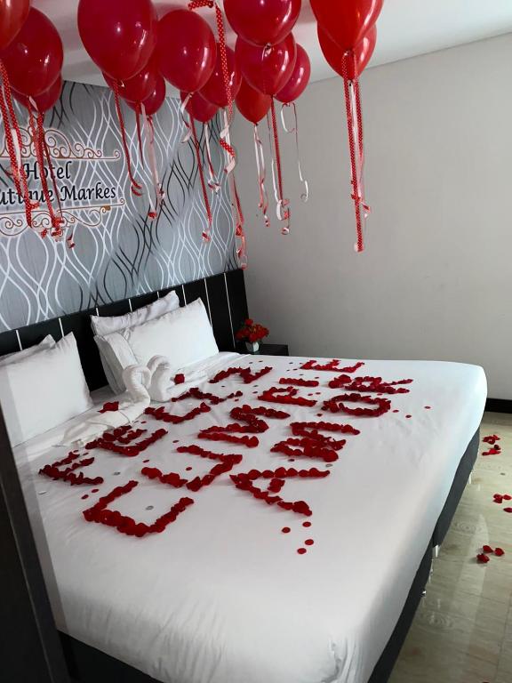 Postel nebo postele na pokoji v ubytování Hotel Boutique Markes