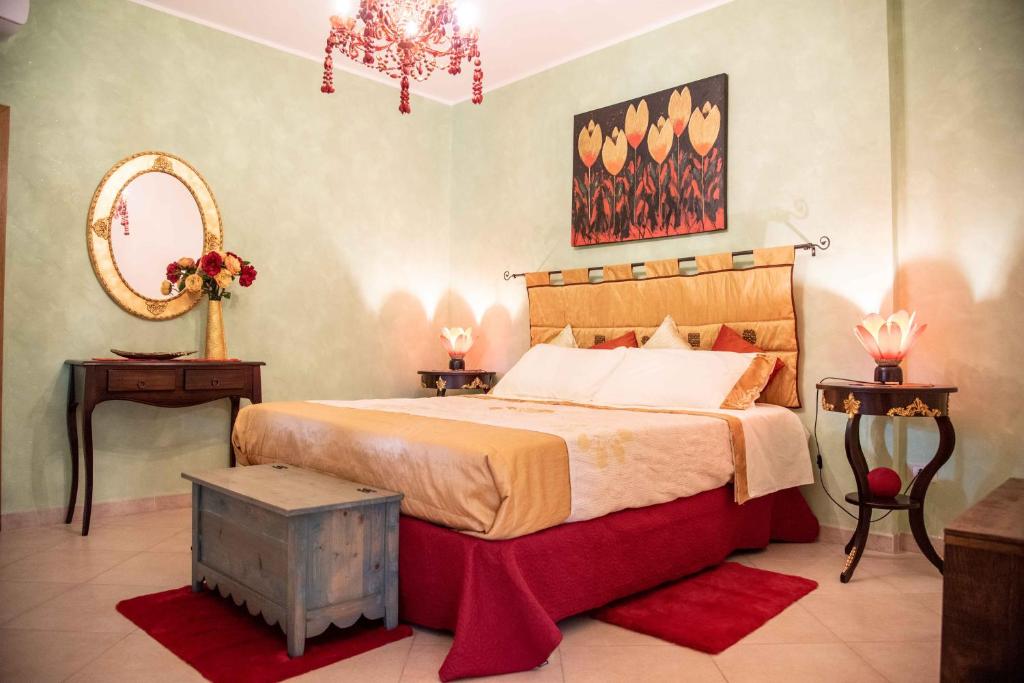 מיטה או מיטות בחדר ב-Sogni d'oro
