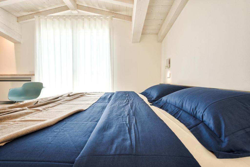 Voodi või voodid majutusasutuse Albamarina Residence toas
