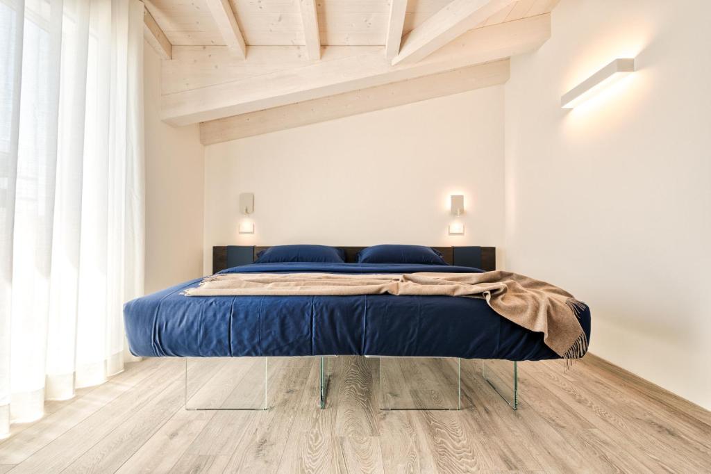 Voodi või voodid majutusasutuse Albamarina Residence toas