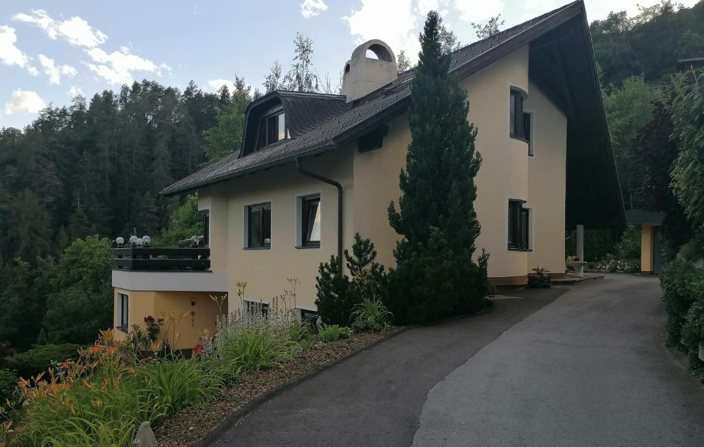 a house with a driveway in front of it at Haus Reinstadler in Imst