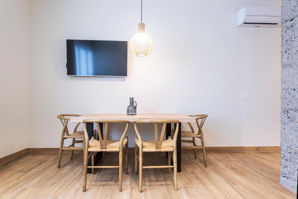 TV a/nebo společenská místnost v ubytování Getaria Apartamentuak - Balentziaga