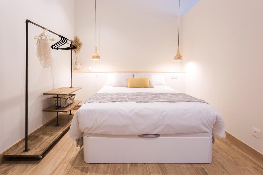 Postel nebo postele na pokoji v ubytování Getaria Apartamentuak - Balentziaga
