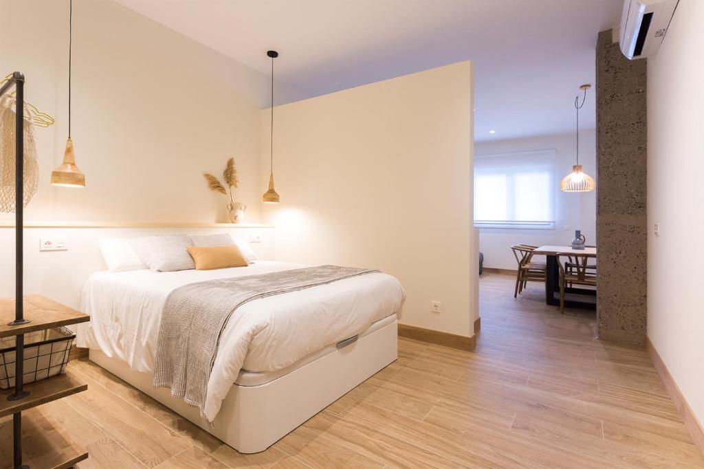 Postel nebo postele na pokoji v ubytování Getaria Apartamentuak - Balentziaga