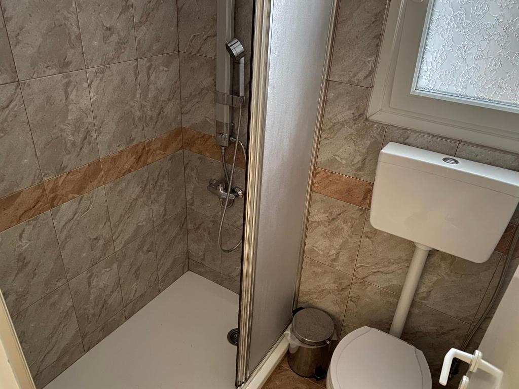 Koupelna v ubytování Irene's cozy apartment