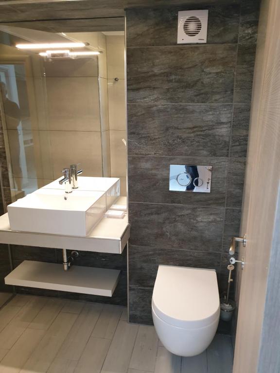 Koupelna v ubytování luxrooms