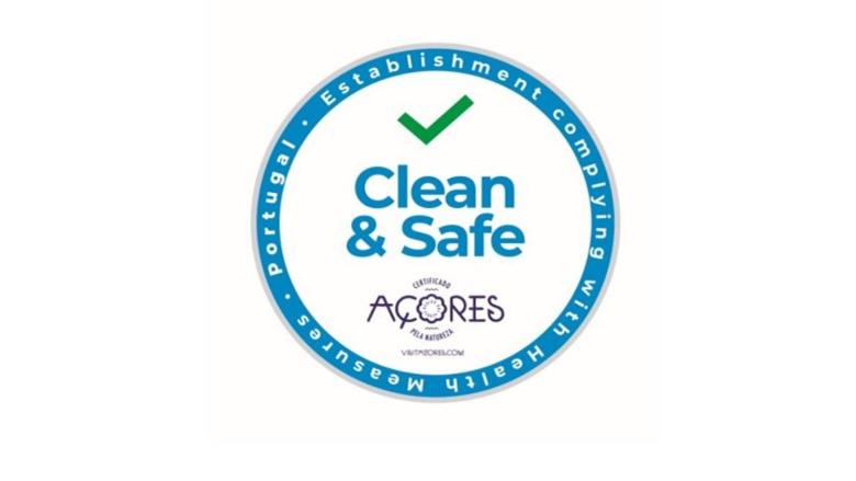 a label for a clean and safe acroos logo at Simon's place in Ponta Delgada