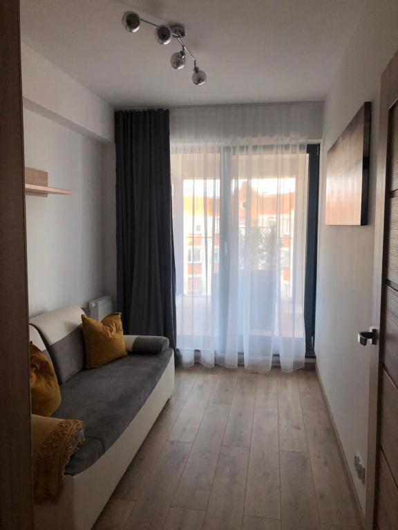 Posedenie v ubytovaní Apartament Złota Brama