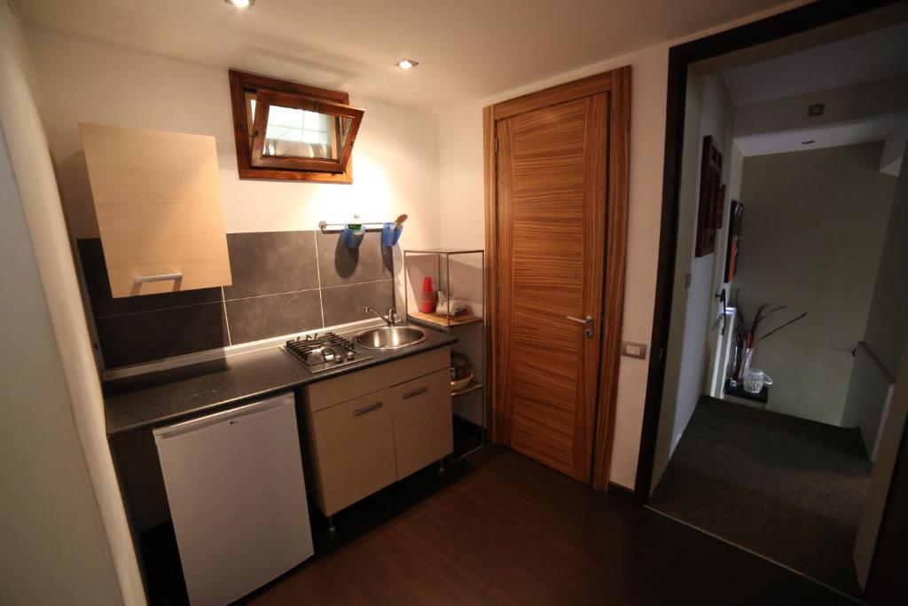 Kuchyňa alebo kuchynka v ubytovaní Bed & Breakfast Idomeneo 63