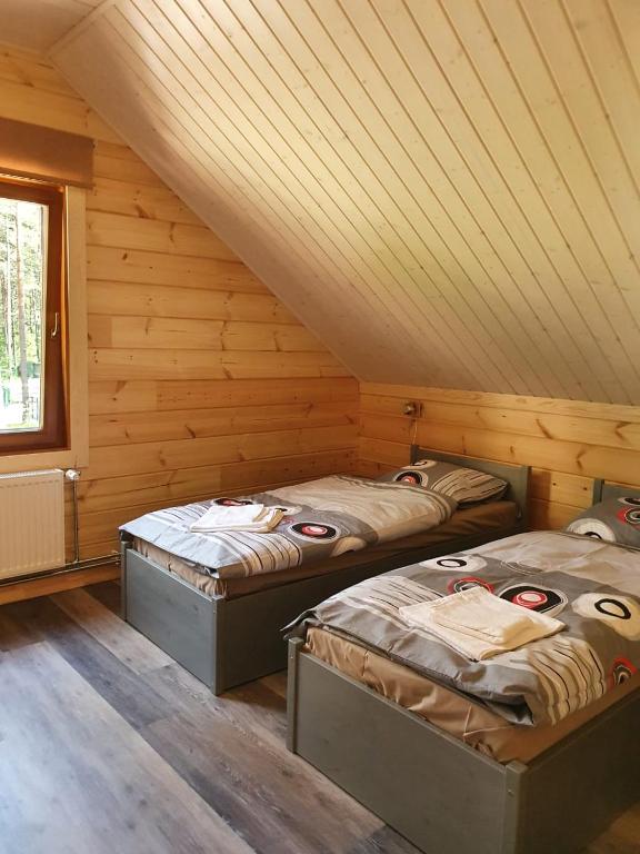 Postel nebo postele na pokoji v ubytování Splife Plus semi-detached cottage