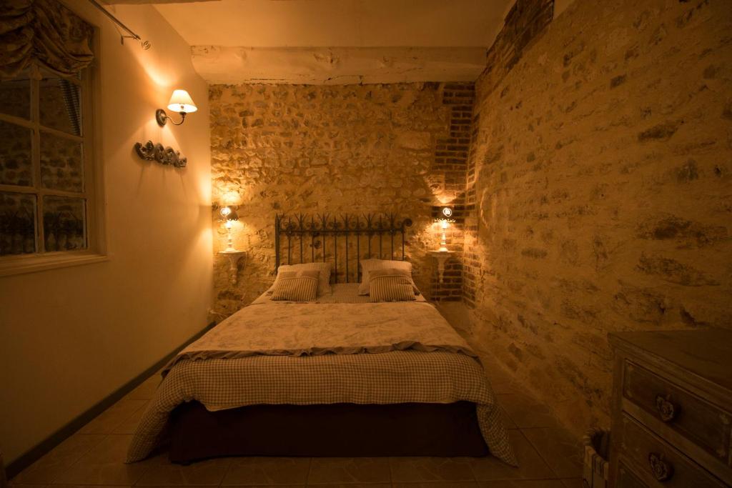Postel nebo postele na pokoji v ubytování Gîte "Le Bleu D'Orage" Dans un Domaine de 7ha Au Calme