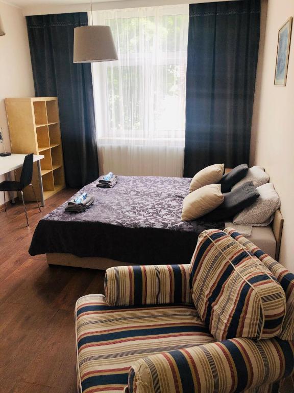 Postel nebo postele na pokoji v ubytování Noclegi Wrzeszcz