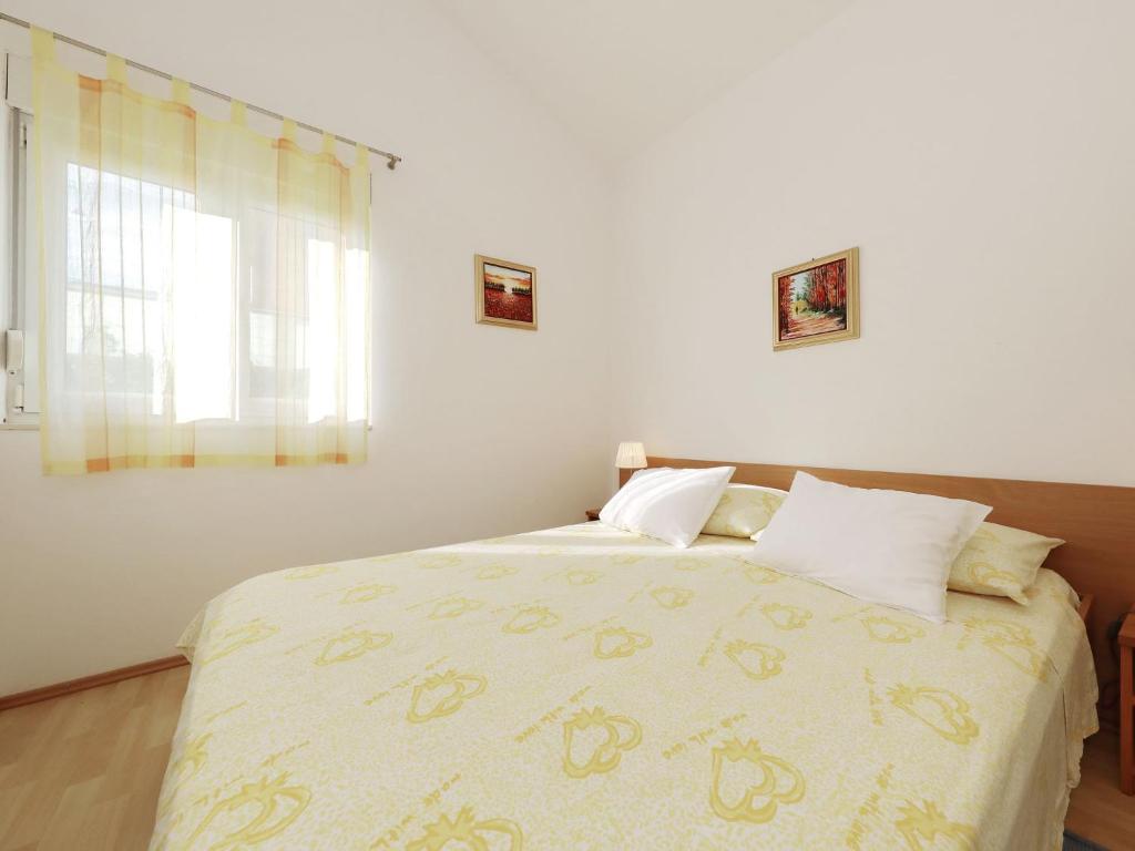 Łóżko lub łóżka w pokoju w obiekcie Modern Holiday Apartment with Private Pool