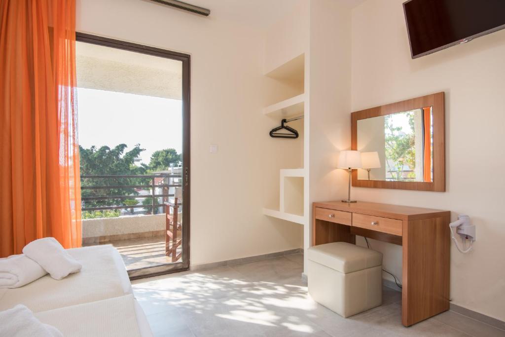TV a/nebo společenská místnost v ubytování Lido Hotel