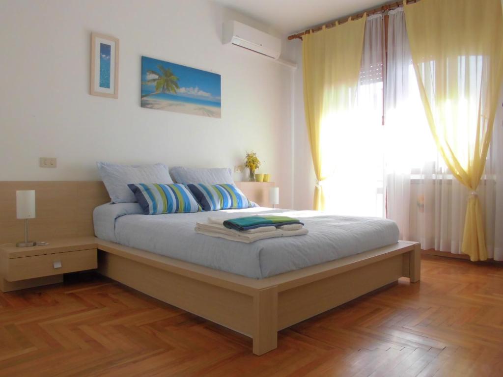 Postel nebo postele na pokoji v ubytování Solare B&B