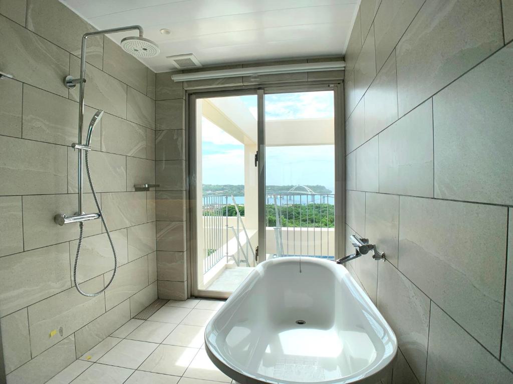 Ein Badezimmer in der Unterkunft KEN KEN VILLA YUUMODORO