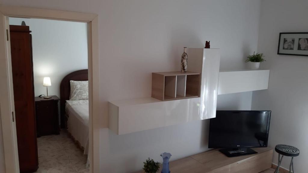 Postel nebo postele na pokoji v ubytování Playa De Mogan La Puntilla