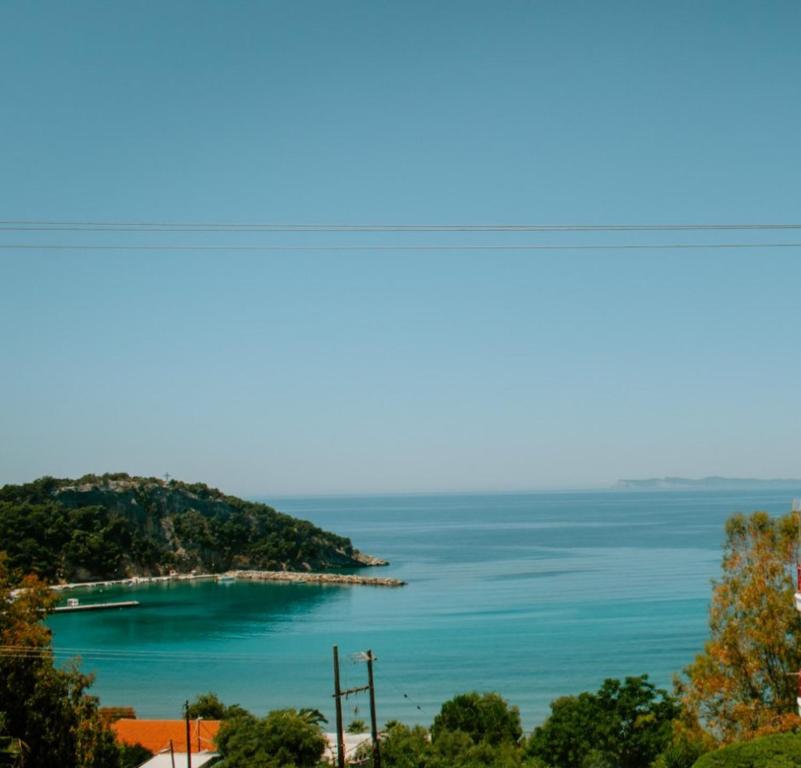 a view of the ocean from a hill at Alexios Apartments in Perdika