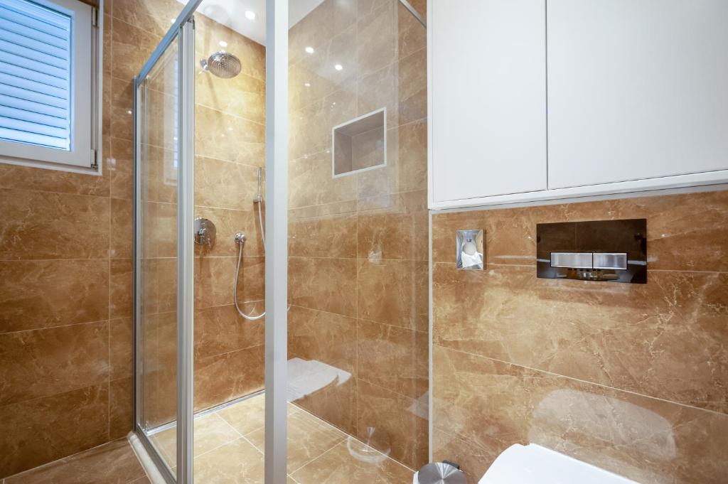 Kúpeľňa v ubytovaní Luxury rooms Kadena