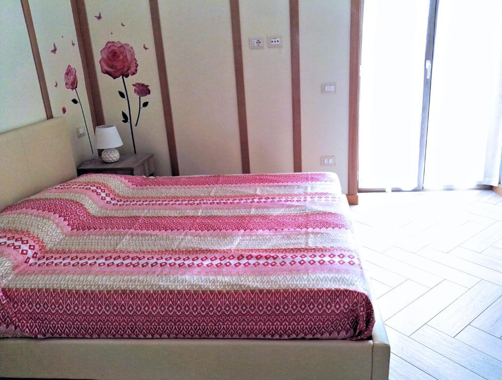 Postel nebo postele na pokoji v ubytování Rosa Vesuviana
