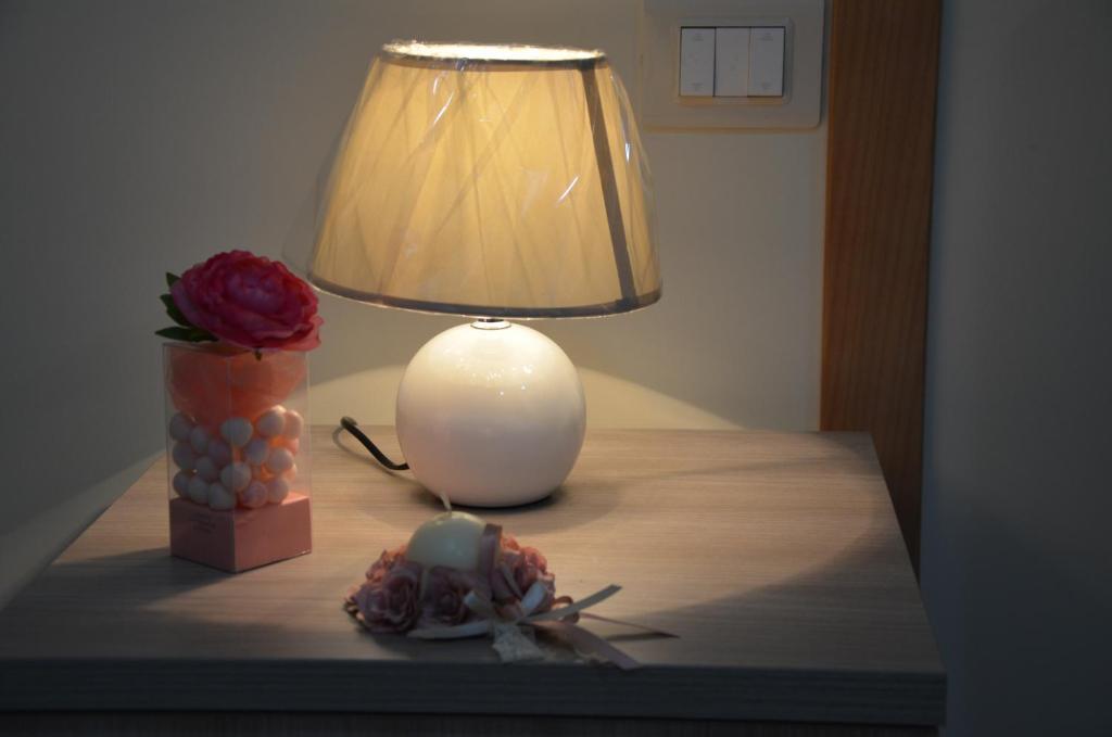 Postel nebo postele na pokoji v ubytování Rosa Vesuviana