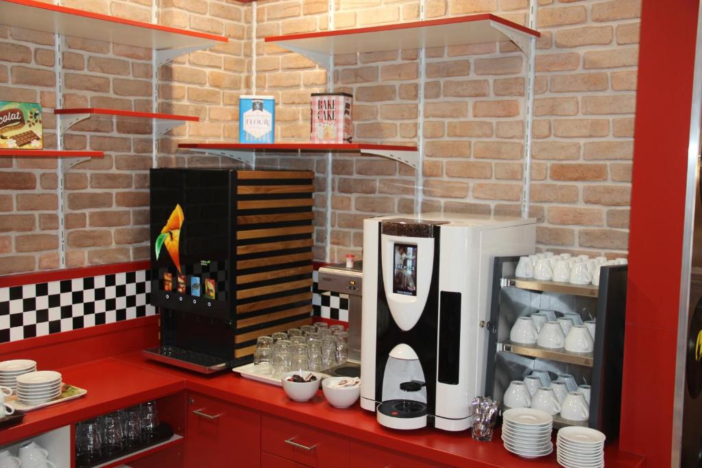 Kuchyň nebo kuchyňský kout v ubytování Jukebox Hotel