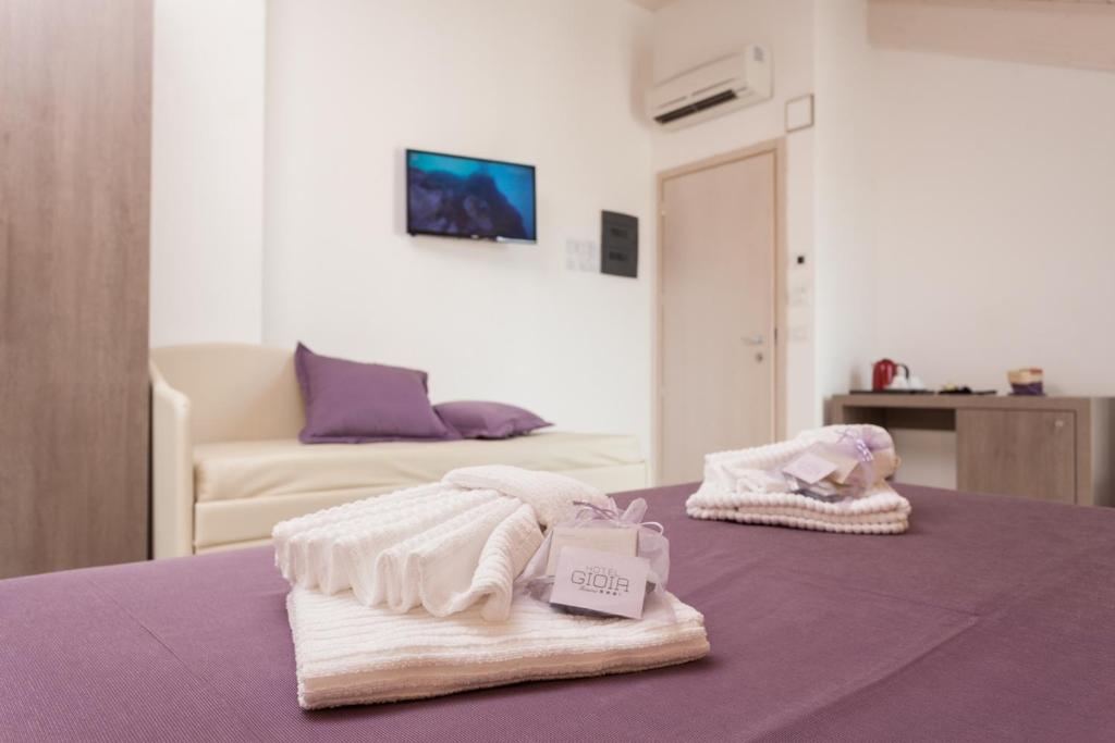Postel nebo postele na pokoji v ubytování Hotel Gioia