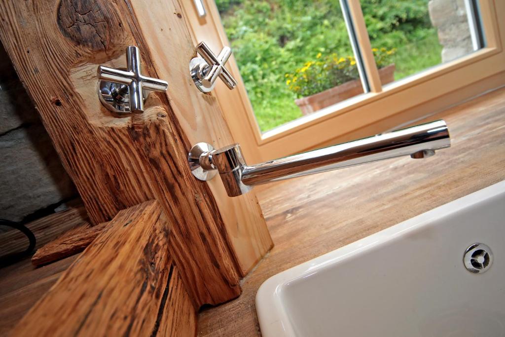 Koupelna v ubytování Ferienhaus Haldenmühle - traumhafte Lage mitten in der Natur mit Sauna